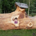 Mia in a log